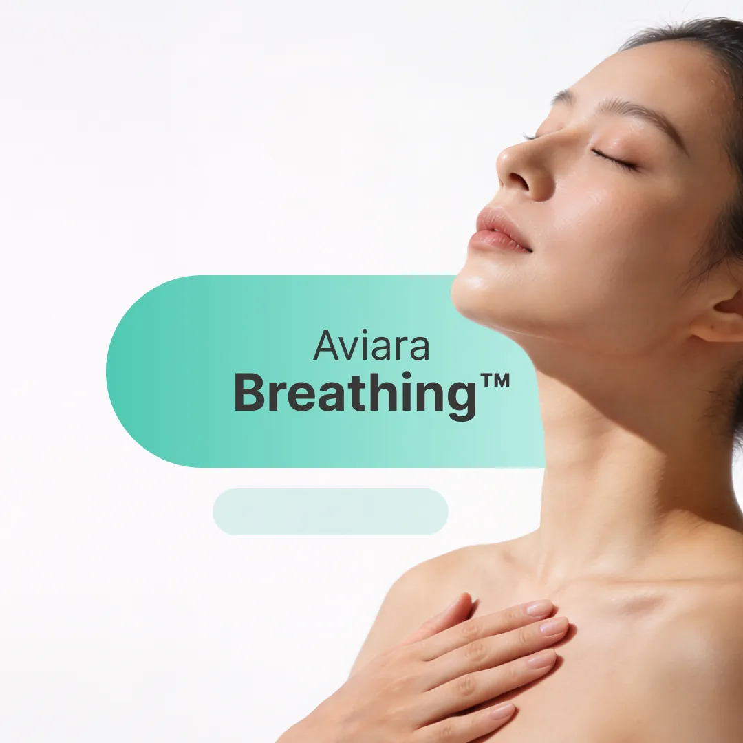 Woman breathing deeply, practicing mindfulness and relaxation techniques.